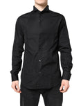 Chemise formelle en coton noir Emporio Armani à manches longues, vue en gros plan sur le tissu et la coupe élégante.