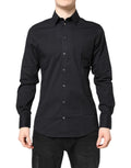 Chemise à manches longues Dolce & Gabbana en coton noir avec accents dorés, élégante et sophistiquée.