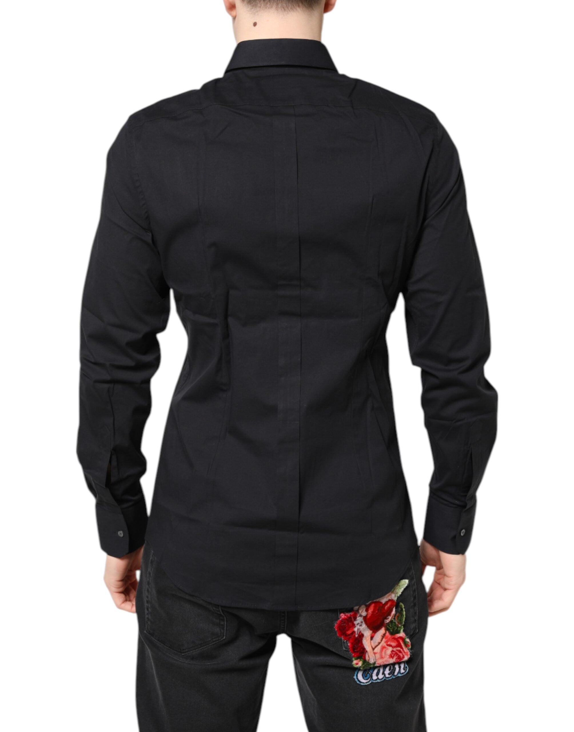 Chemise noire Dolce & Gabbana en coton à manches longues avec détails dorés, élégante et sophistiquée.