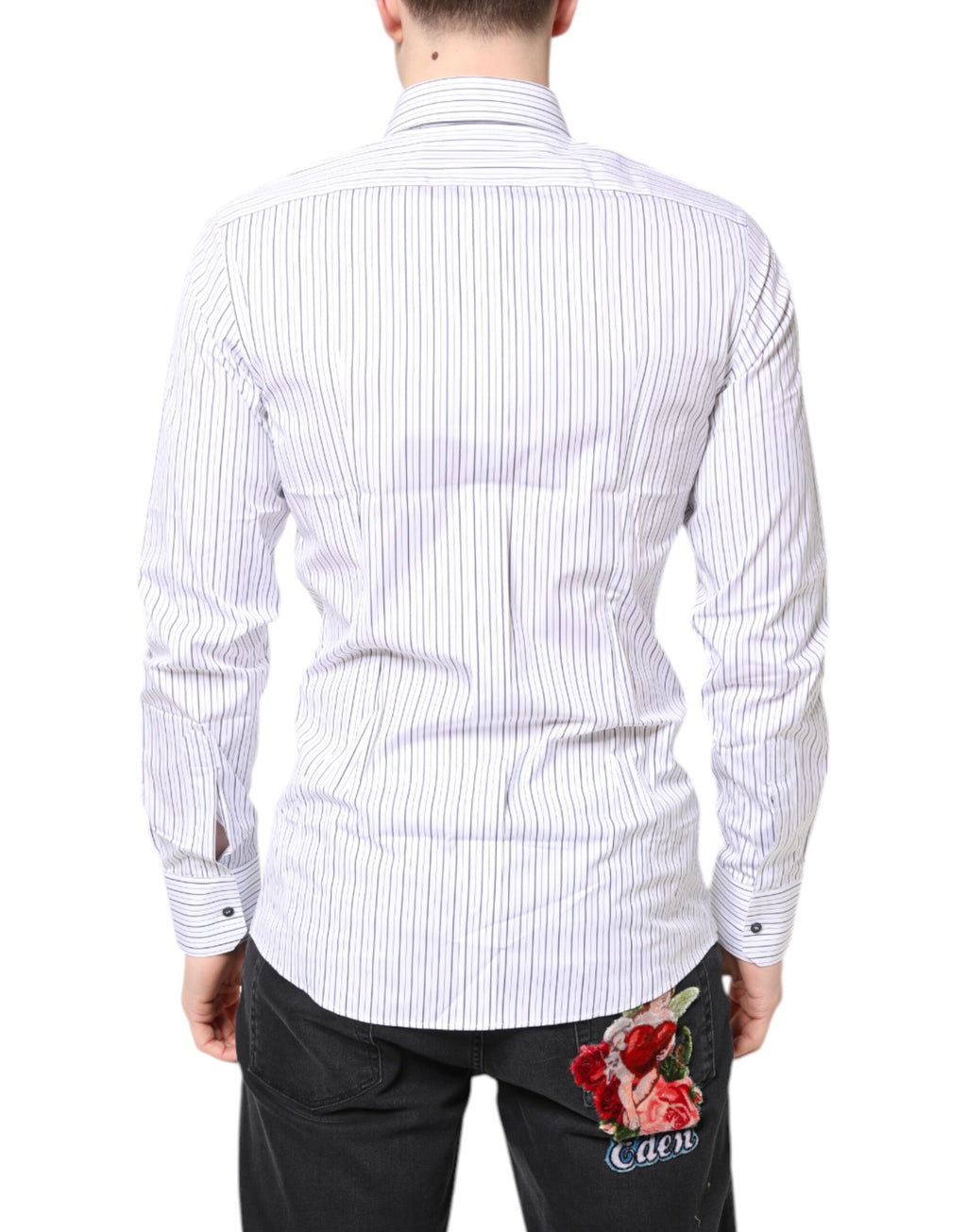 Chemise formelle blanche à rayures dorées en coton de Dolce & Gabbana, élégante et sophistiquée, visible en gros plan.