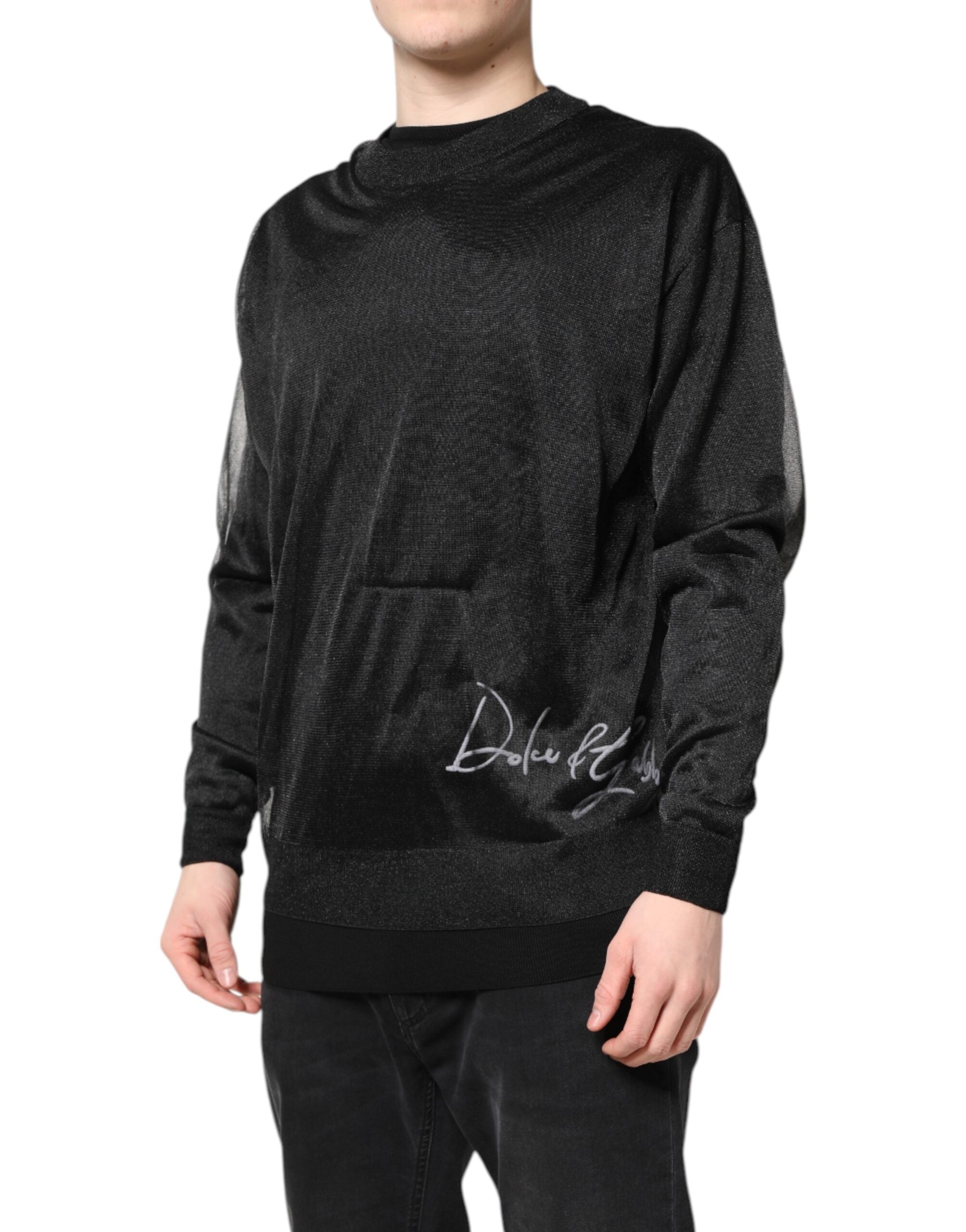 Pull noir en maille avec logo Dolce & Gabbana, col rond et style décontracté, visible sur l'image.