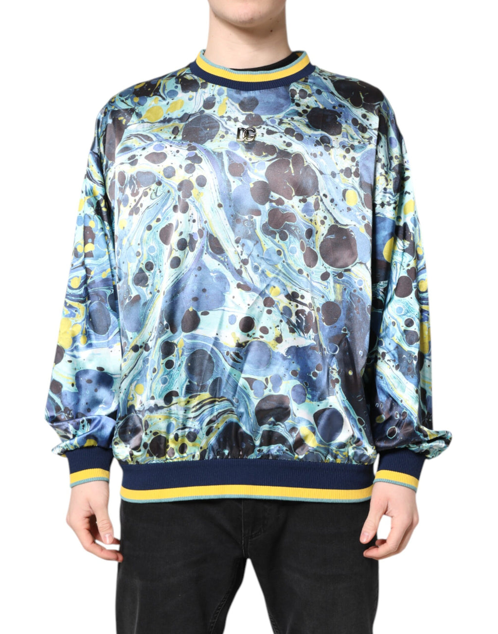 Pull homme Dolce & Gabbana à motif marbre multicolore, style élégant et moderne, visible sur l'image.