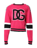 Pull à manches longues Dolce & Gabbana en coton rose avec logo imprimé, pull-over confortable et stylé.
