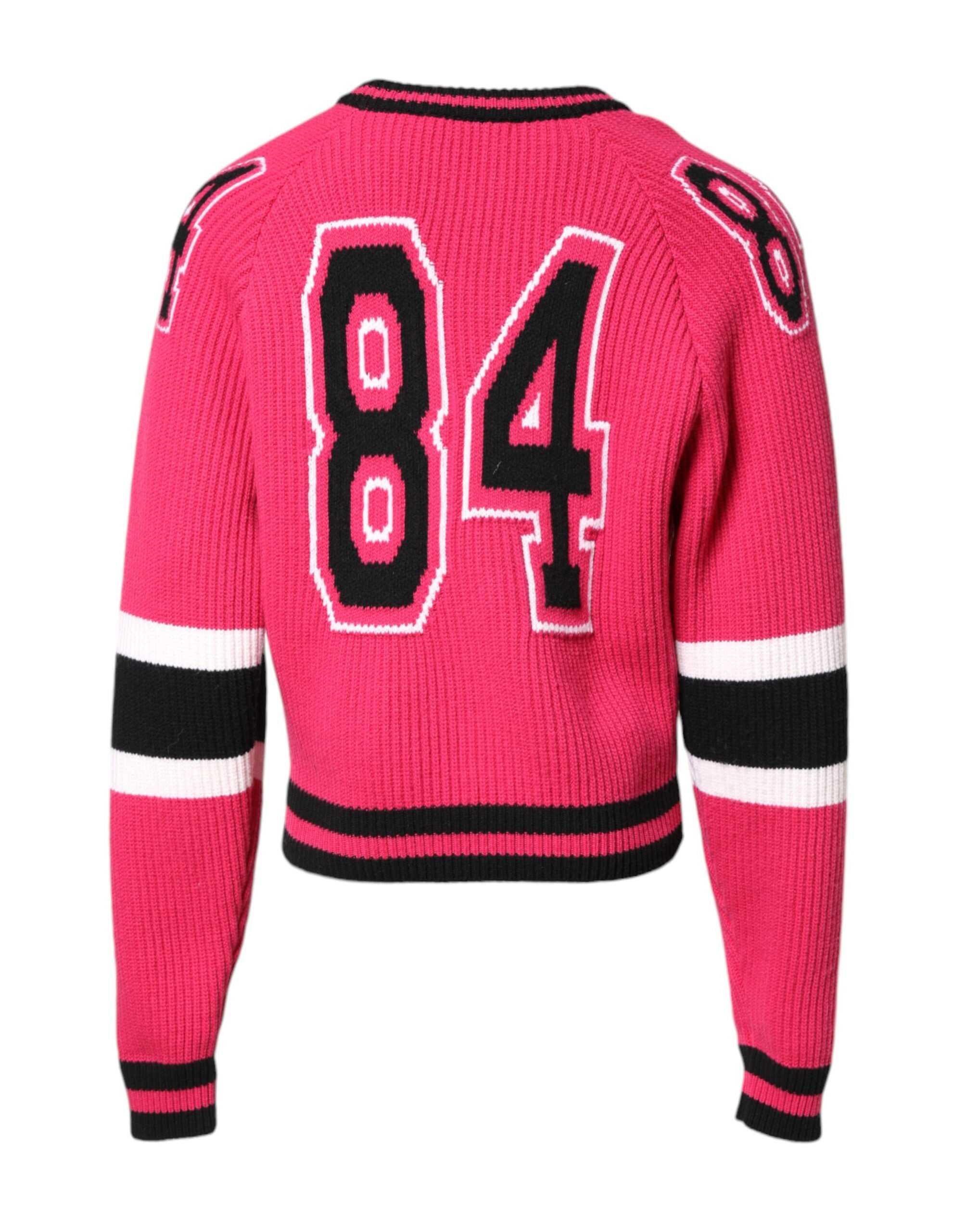 Pull à manches longues Dolce & Gabbana en coton rose avec logo imprimé, doux et confortable, pour un style élégant.