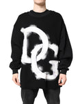 Pull à manches longues Dolce & Gabbana en coton noir avec logo imprimé pour homme, style décontracté et moderne.