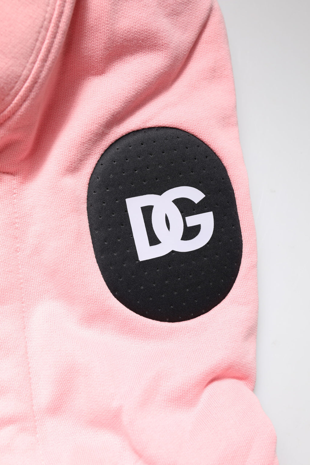 Gilet de sport rose en coton pour homme de Dolce & Gabbana avec capuche, style décontracté et confortable.
