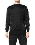 Pull en maille noir Dolce & Gabbana avec logo, col rond, aspect confortable et élégant, pour un style chic et décontracté.