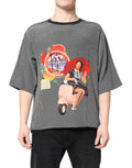 T-shirt à manches courtes noir Dolce & Gabbana avec imprimé graphique distinctif, design moderne et logo visible.