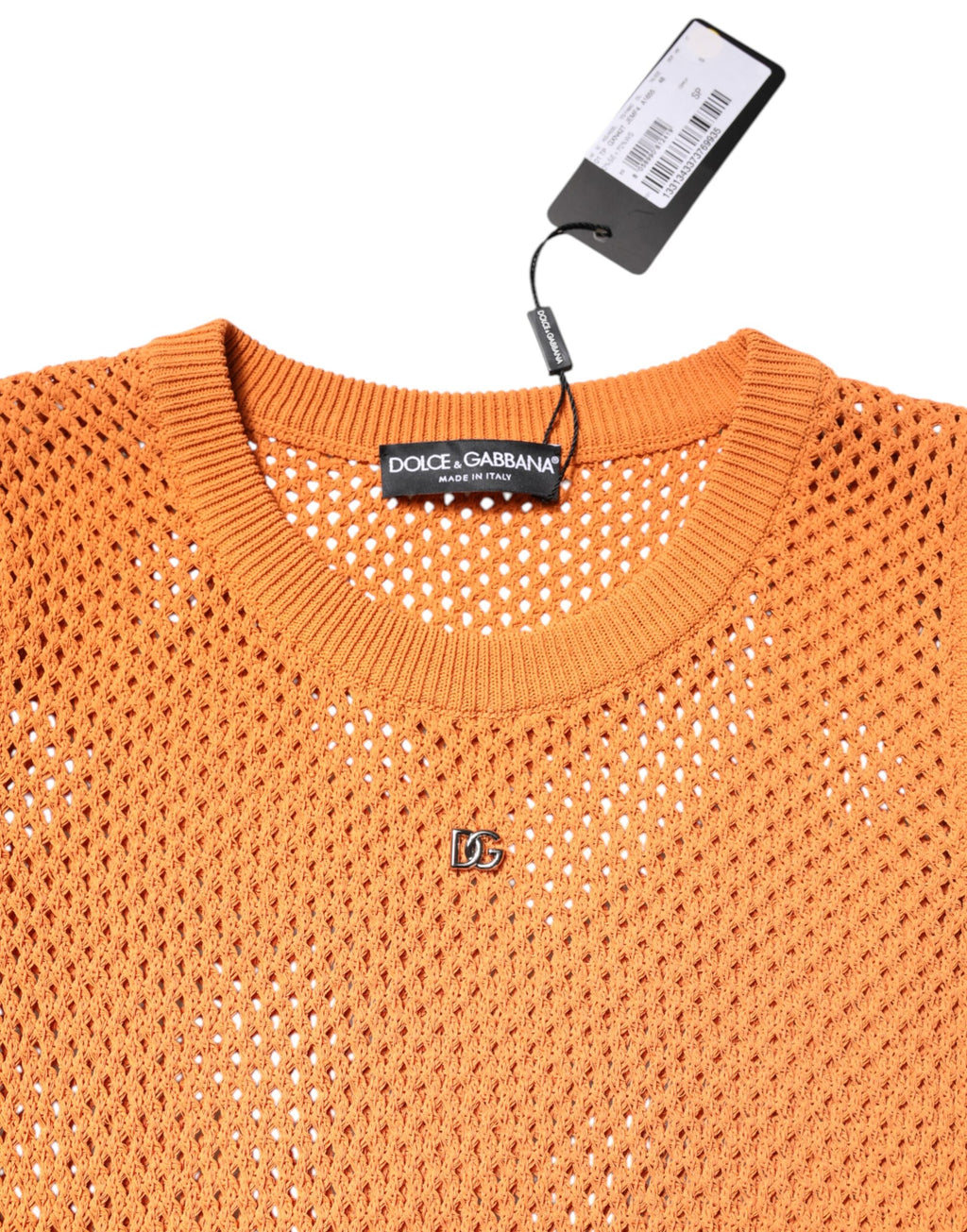 T-shirt sans manches en cachemire orange de Dolce & Gabbana avec col rond, élégant et confortable pour un style sophistiqué.