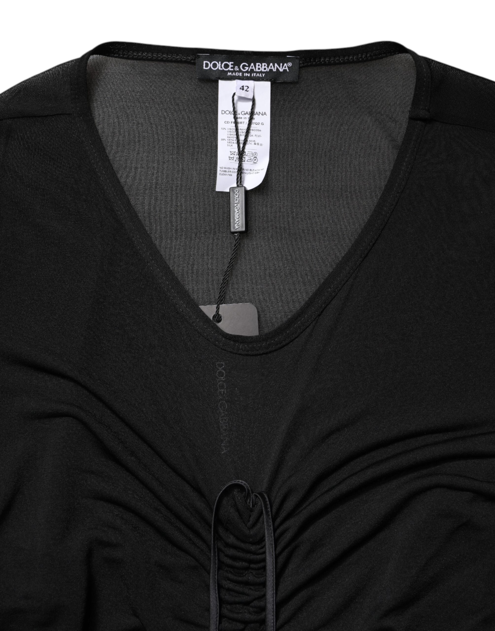 Robe moulante noire Dolce & Gabbana en mesh, longue et élégante avec finitions en trim en mesh.