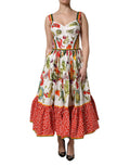 Robe sans manches blanche Dolce & Gabbana avec motif légumes, coupe en A, tissu léger et élégant.