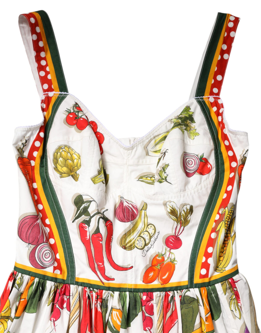 Robe sans manches Dolce & Gabbana blanche avec motif de légumes, coupe en A, tissu léger et élégant.