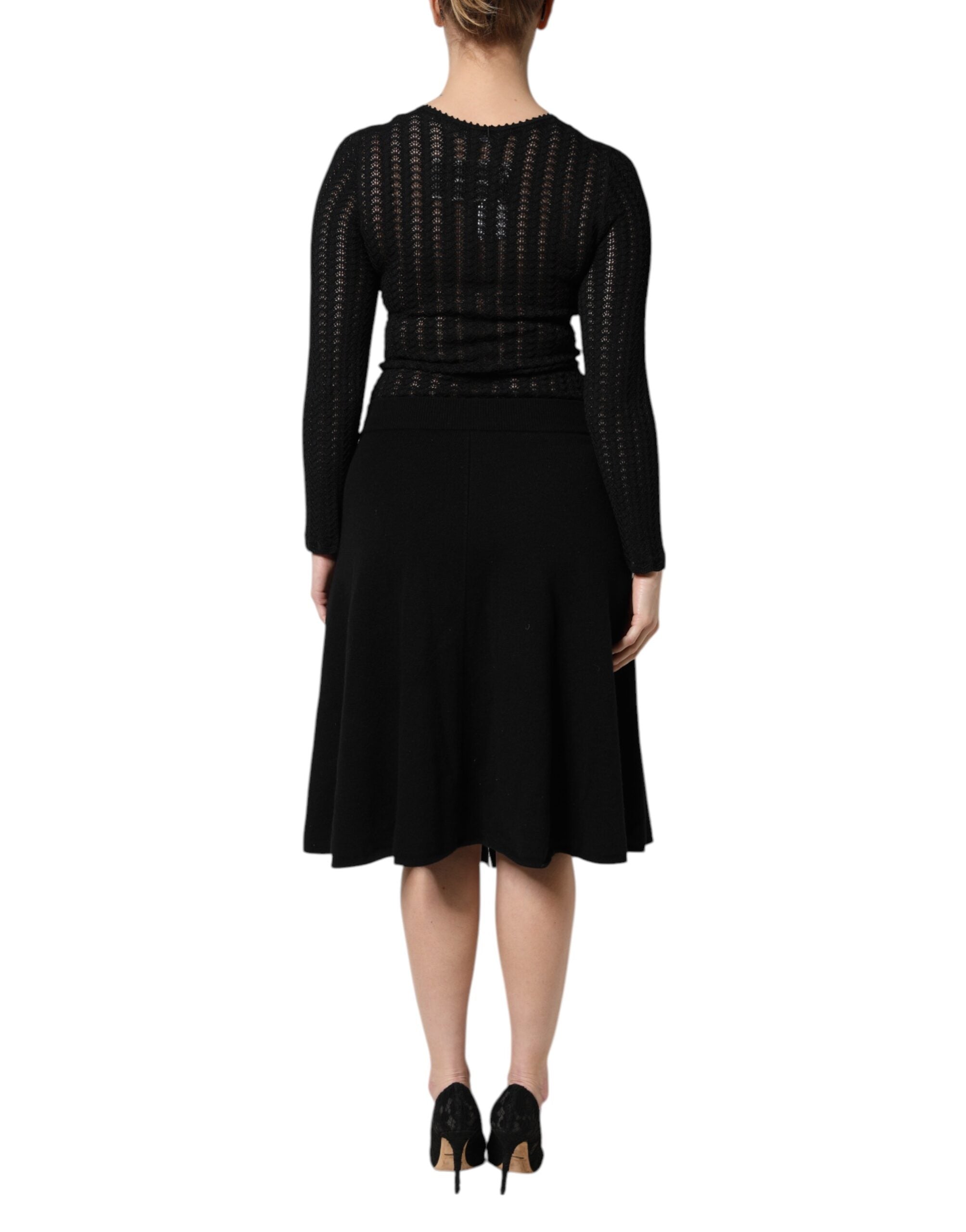 Robe midi noire en cachemire à manches longues de Dolce & Gabbana, coupe en A élégante et sophistiquée.