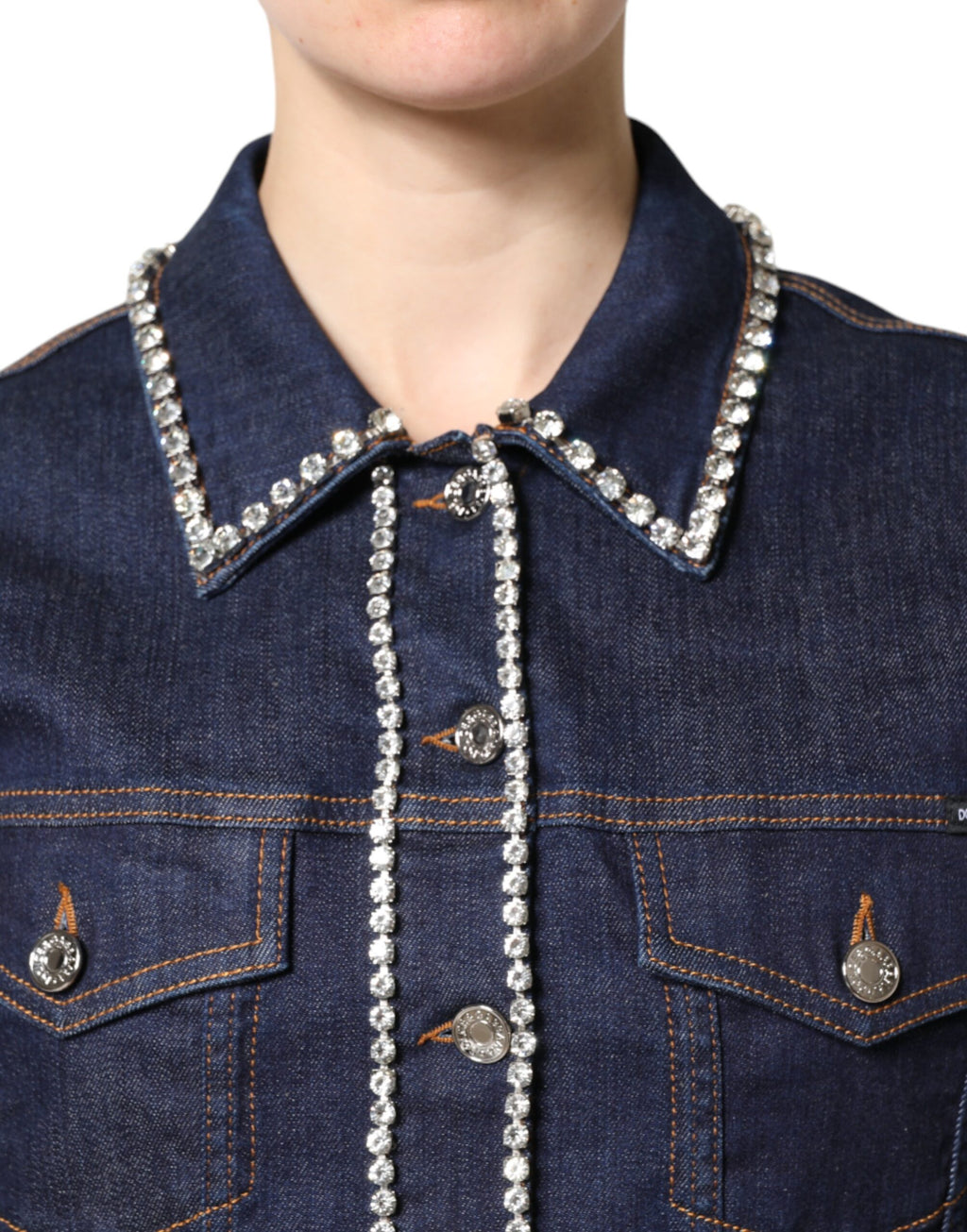 Veste en denim bleu Dolce & Gabbana en coton avec embellissements en cristal, style élégant et tendance.