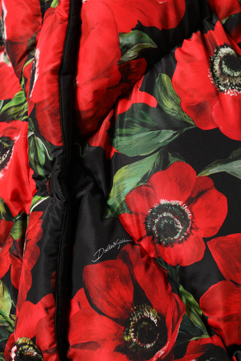 Veste matelassée Dolce & Gabbana à fleurs multicolores avec fermeture éclair complète, style élégant et coloré.