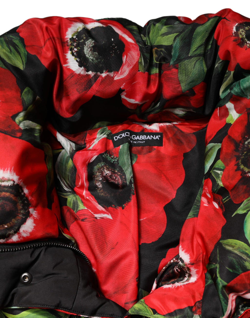 Veste rembourrée Dolce & Gabbana à fleurs multicolores, zip complet, style élégant et tendance.