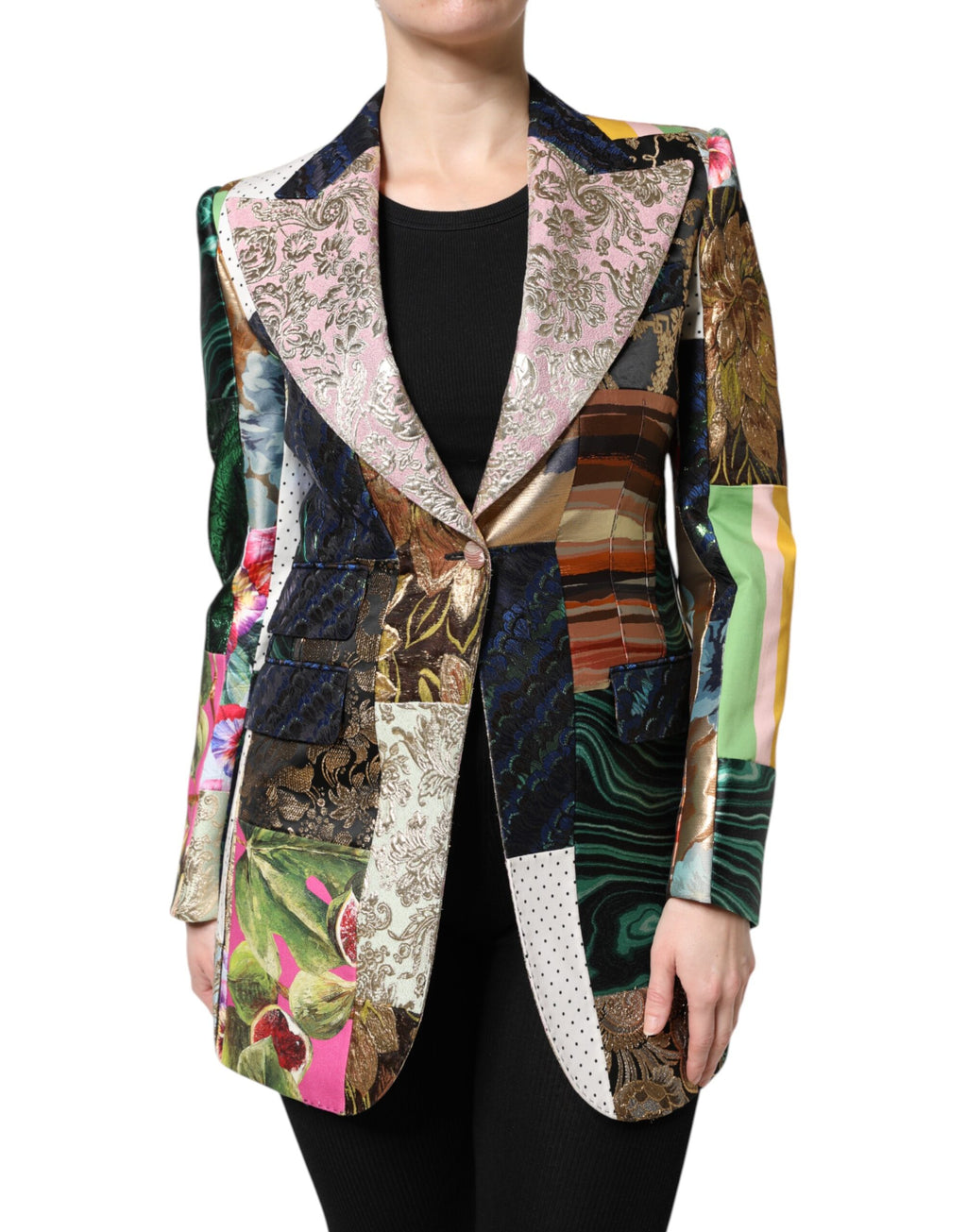 Veste en jacquard Dolce & Gabbana à motifs floraux multicolores et patchwork, détails visibles en tissu riche et coloré.