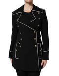 Blazer en laine noire Dolce & Gabbana à double boutonnage, coupe élégante et style sophistiqué, porté sur un mannequin.