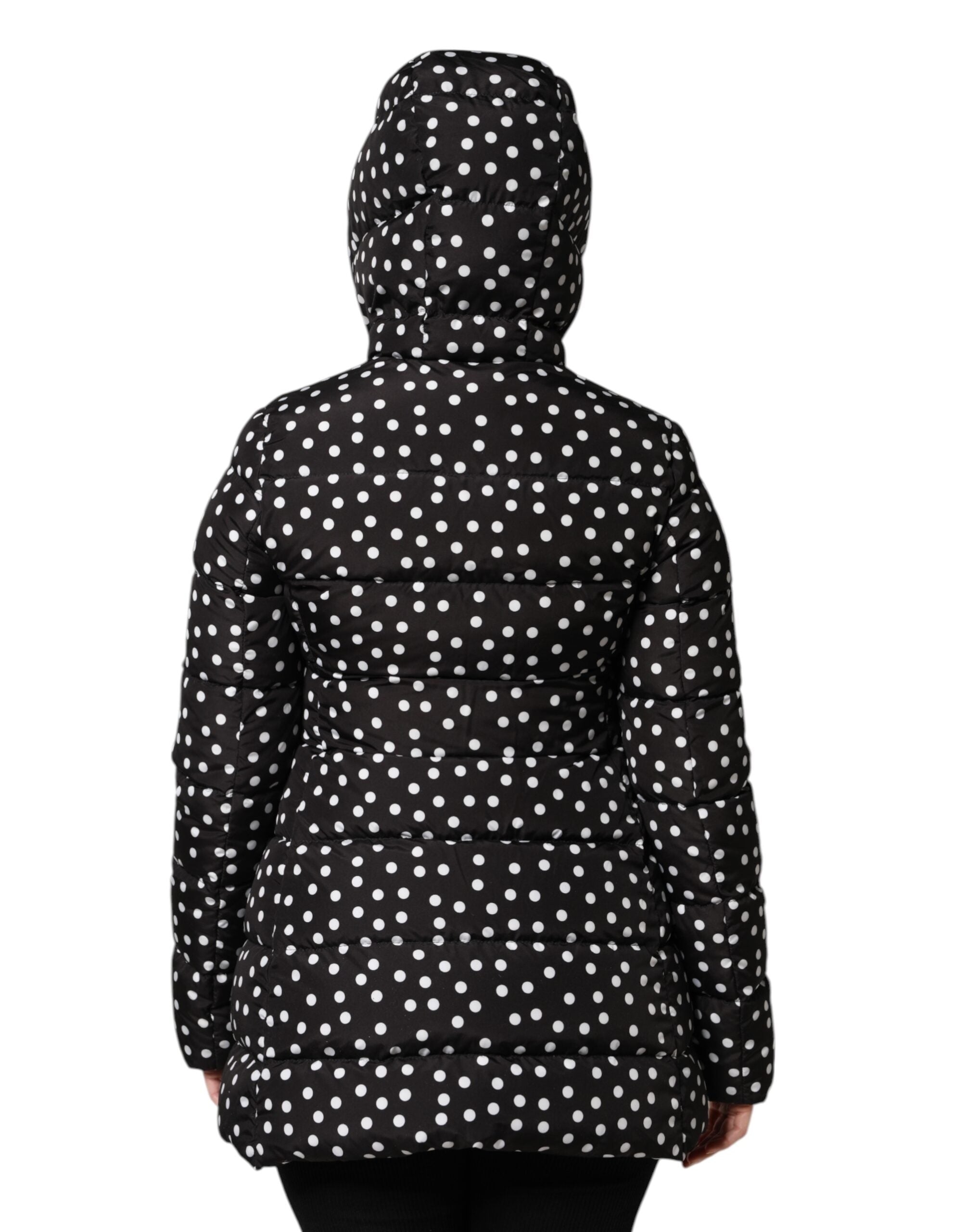 Veste réversible matelassée noire à capuche Dolce & Gabbana, avec fermeture éclair et design chaud et élégant.