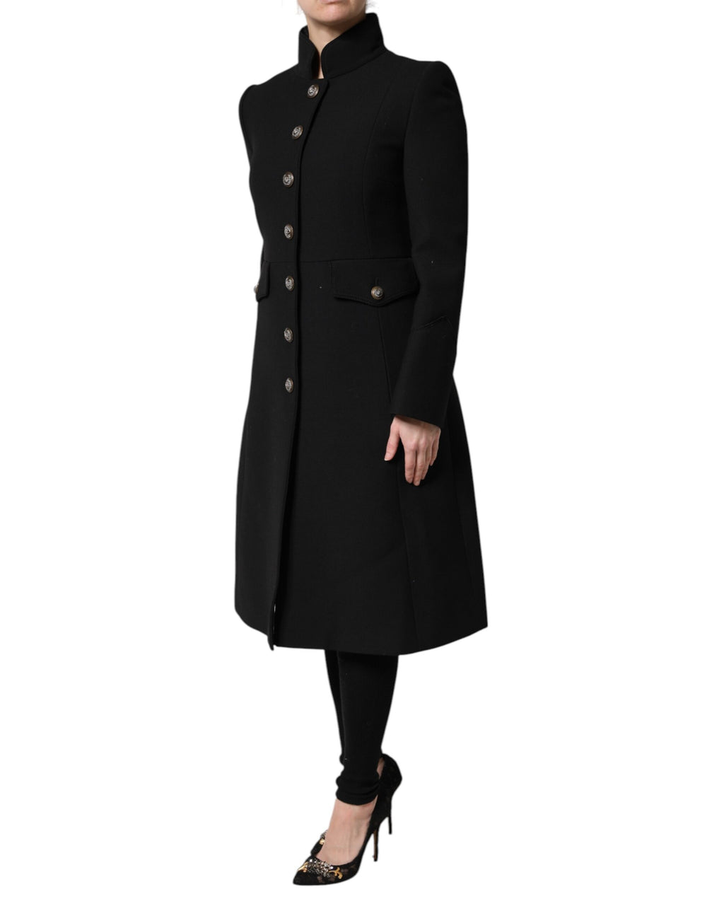 Manteau trench en laine noire à un seul boutonnage de Dolce & Gabbana, veste élégante avec col classique et ceinture ajustable.