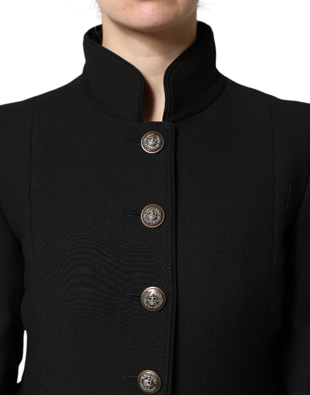 Manteau trench noir en laine Dolce & Gabbana, coupe croisée simple, avec col et boutons élégants, vue frontale.