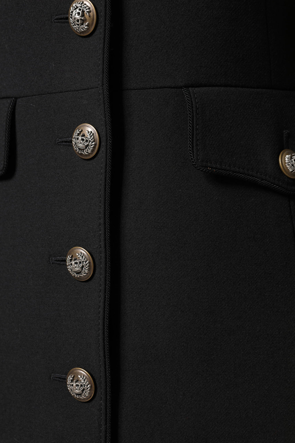 Manteau trench en laine noire à simple boutonnage de Dolce & Gabbana, veste élégante avec col classique et coupe ajustée.