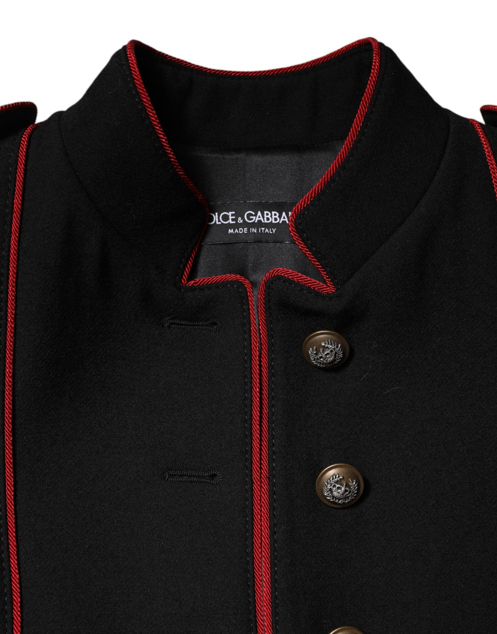 Manteau trench en laine noire à simple boutonnage de Dolce & Gabbana, veste élégante avec col et poches latérales.