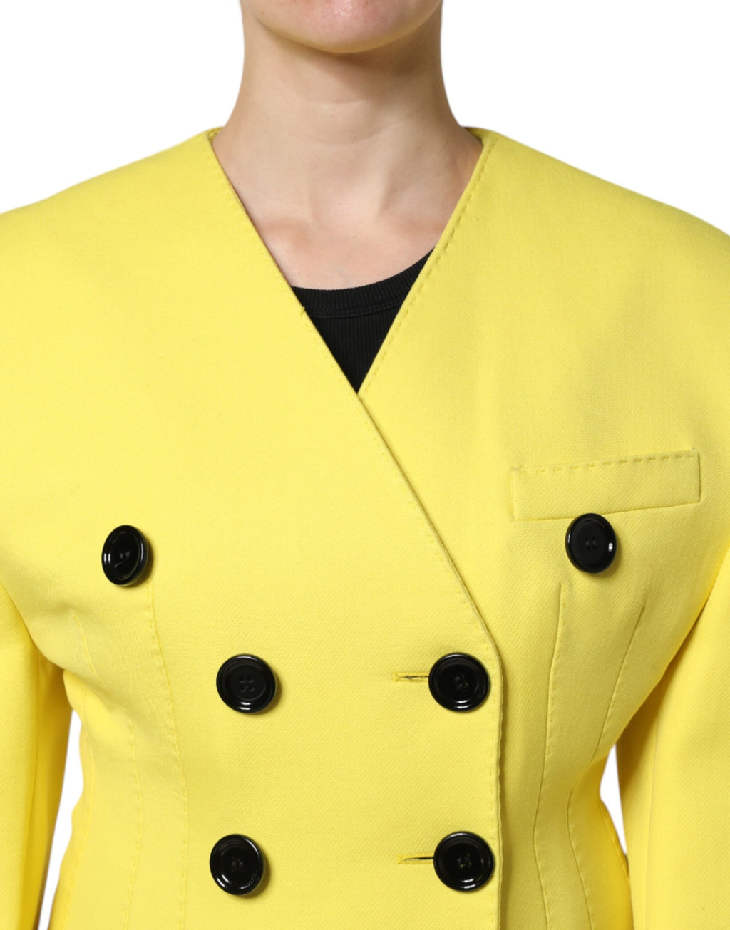 Manteau trench double boutonnage jaune Dolce & Gabbana pour femmes, longueur mi-mollet, style élégant et sophistiqué.