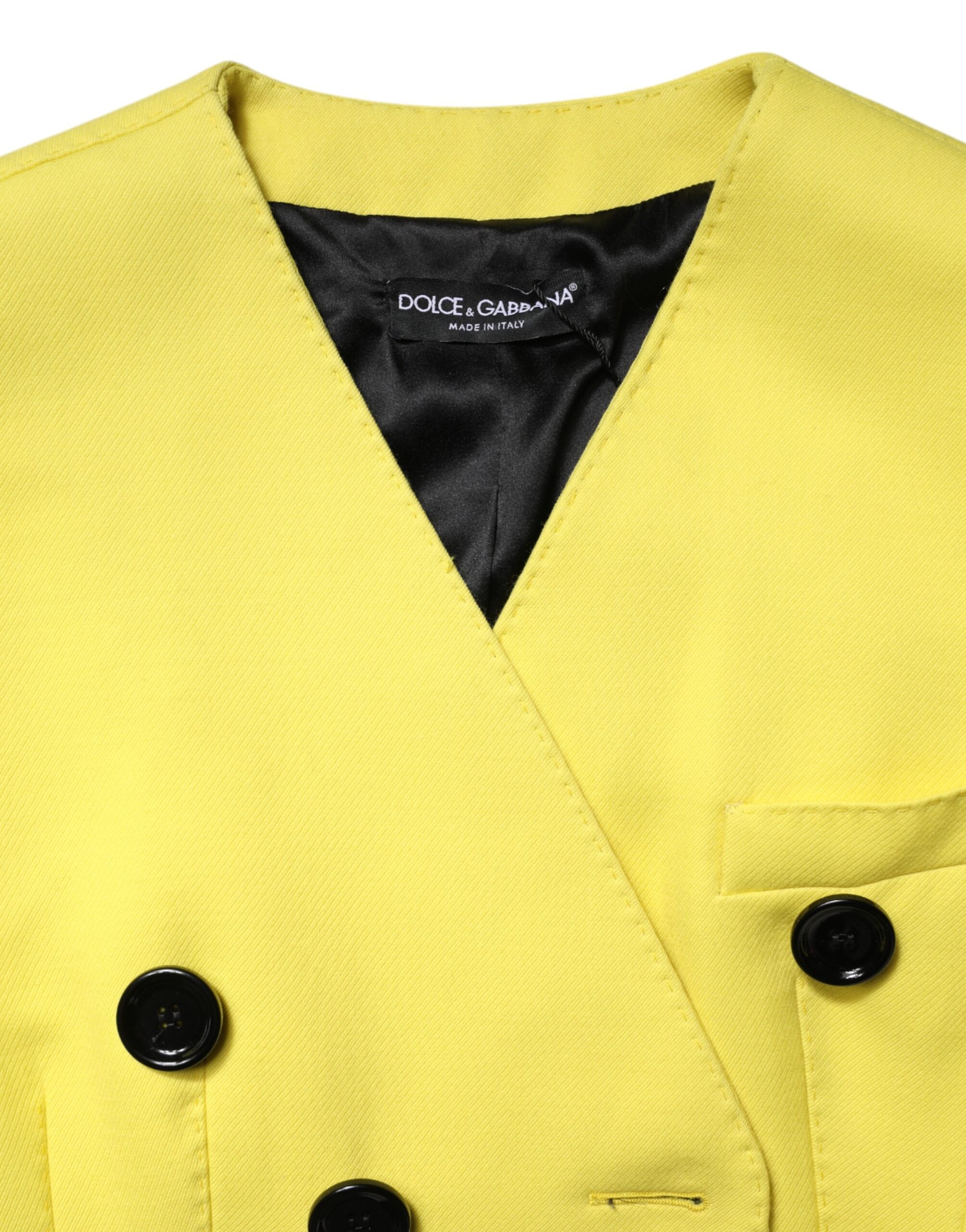 Manteau trench double boutonnage jaune Dolce & Gabbana en tissu léger avec ceinture à la taille et col classique.