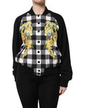 Veste à carreaux noir et blanc avec motifs floraux et boutons de la marque Dolce & Gabbana, vue de face.