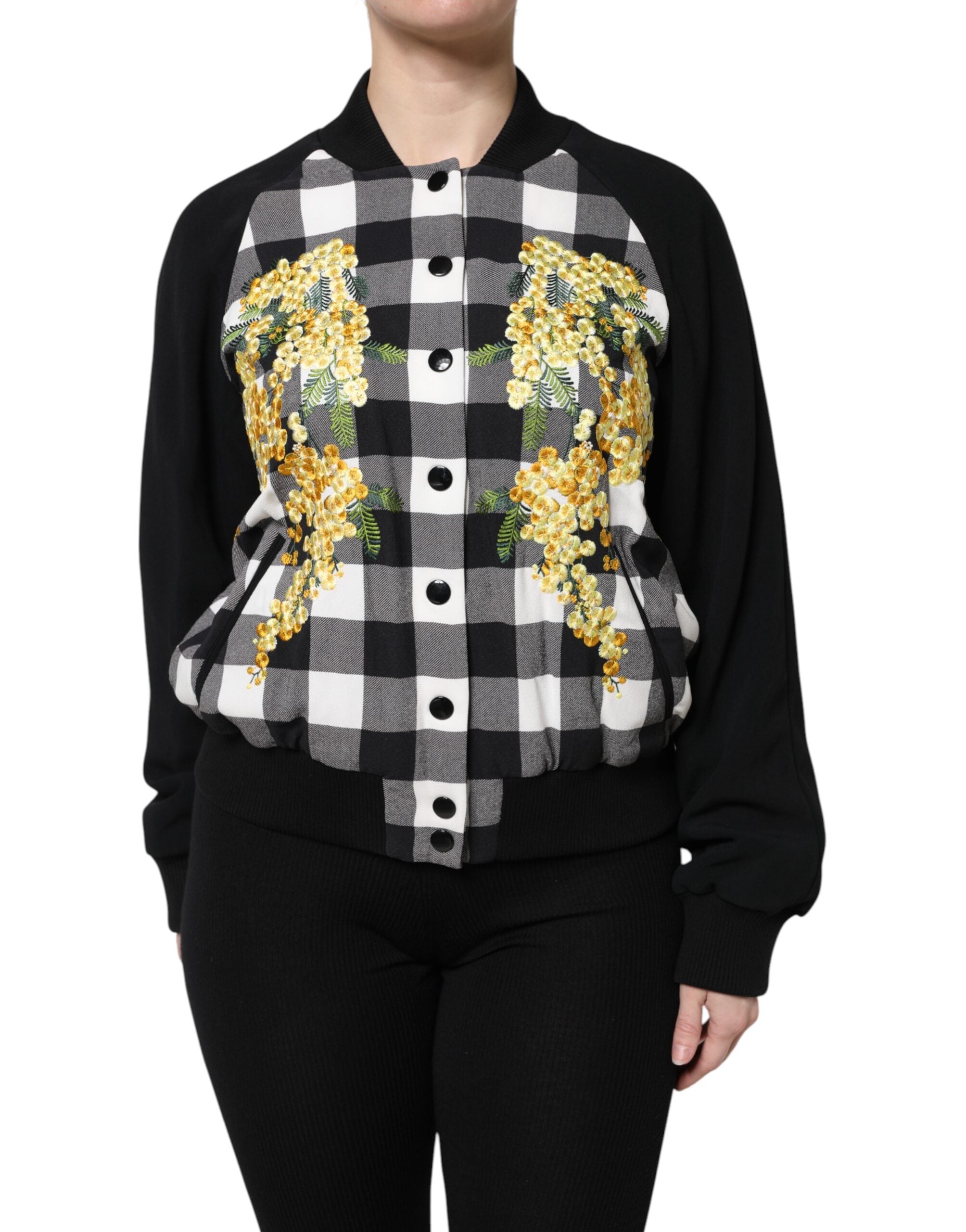 Veste à carreaux noir et blanc avec motifs floraux et boutons de la marque Dolce & Gabbana, vue de face.