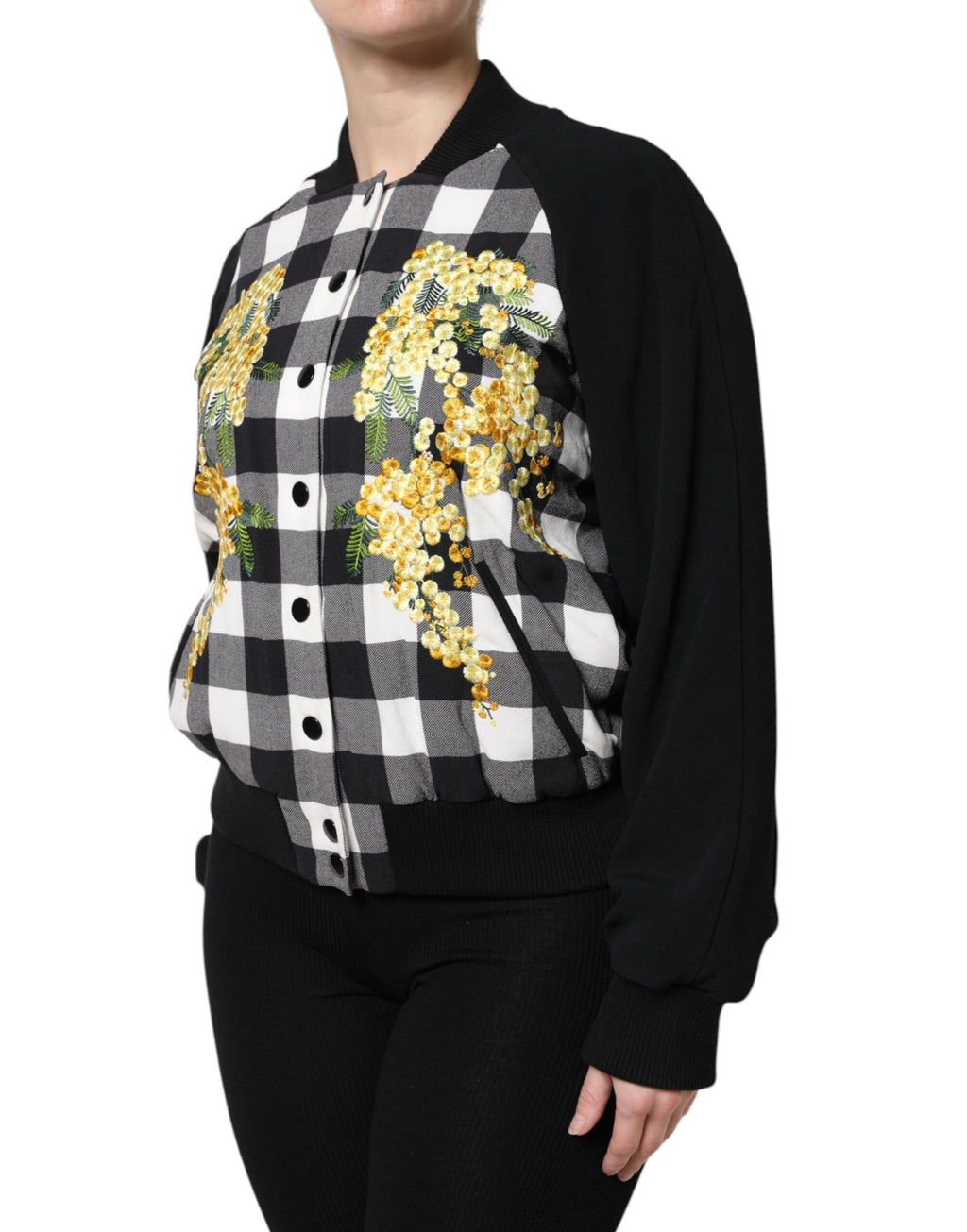 Veste à carreaux noir et blanc avec fleurs et boutons, style Dolce & Gabbana, mode élégante pour femmes.