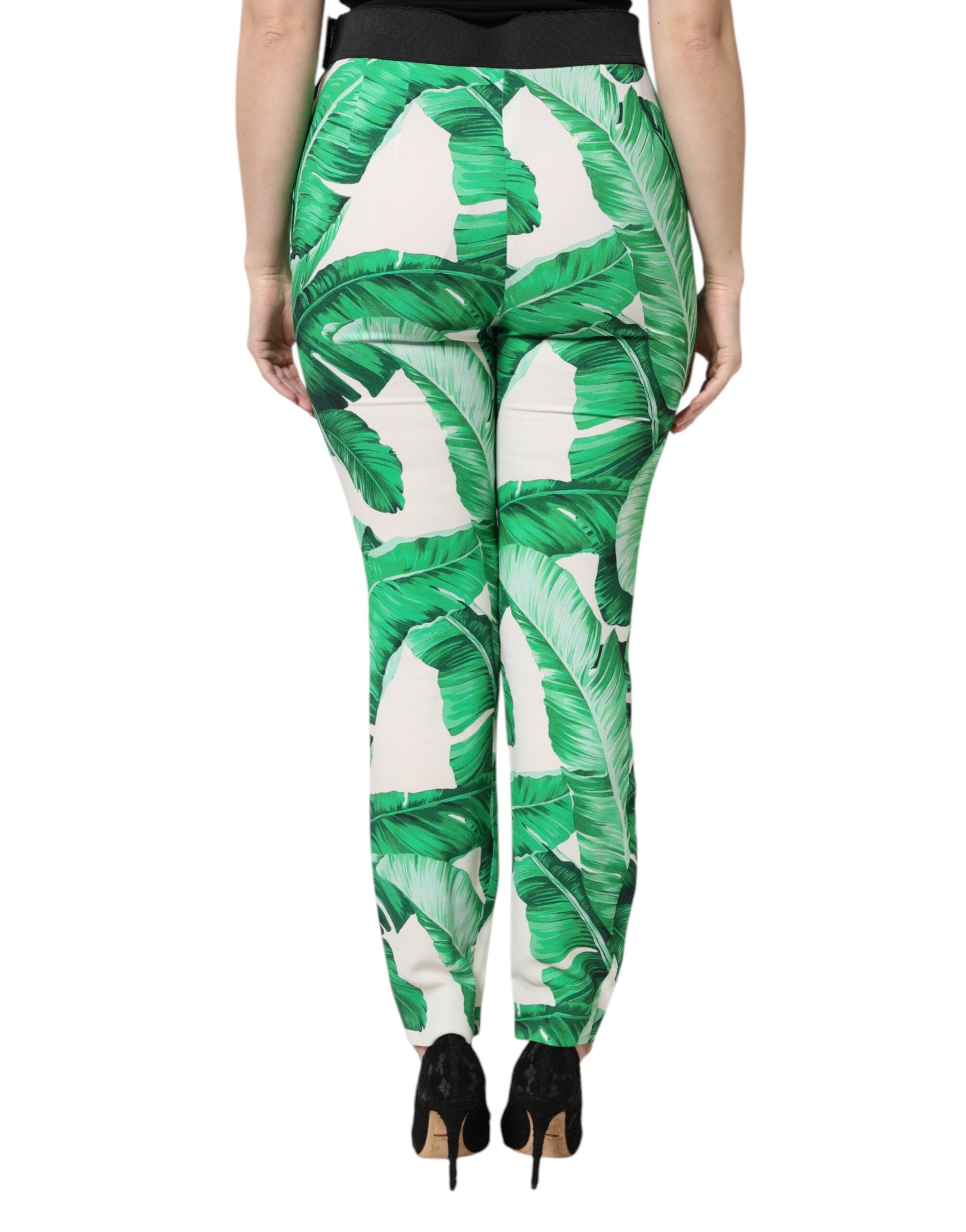 Pantalon blanc et vert à taille haute Dolce & Gabbana avec motif feuilles, élégant et tendance.
