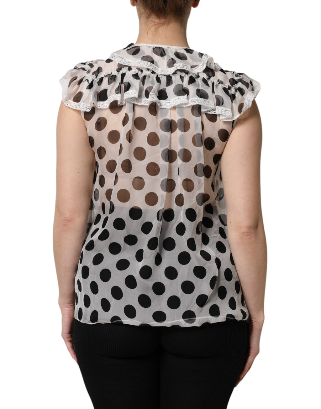 Haut sans manches en coton blanc et noir à pois de Dolce & Gabbana, style élégant et décontracté.
