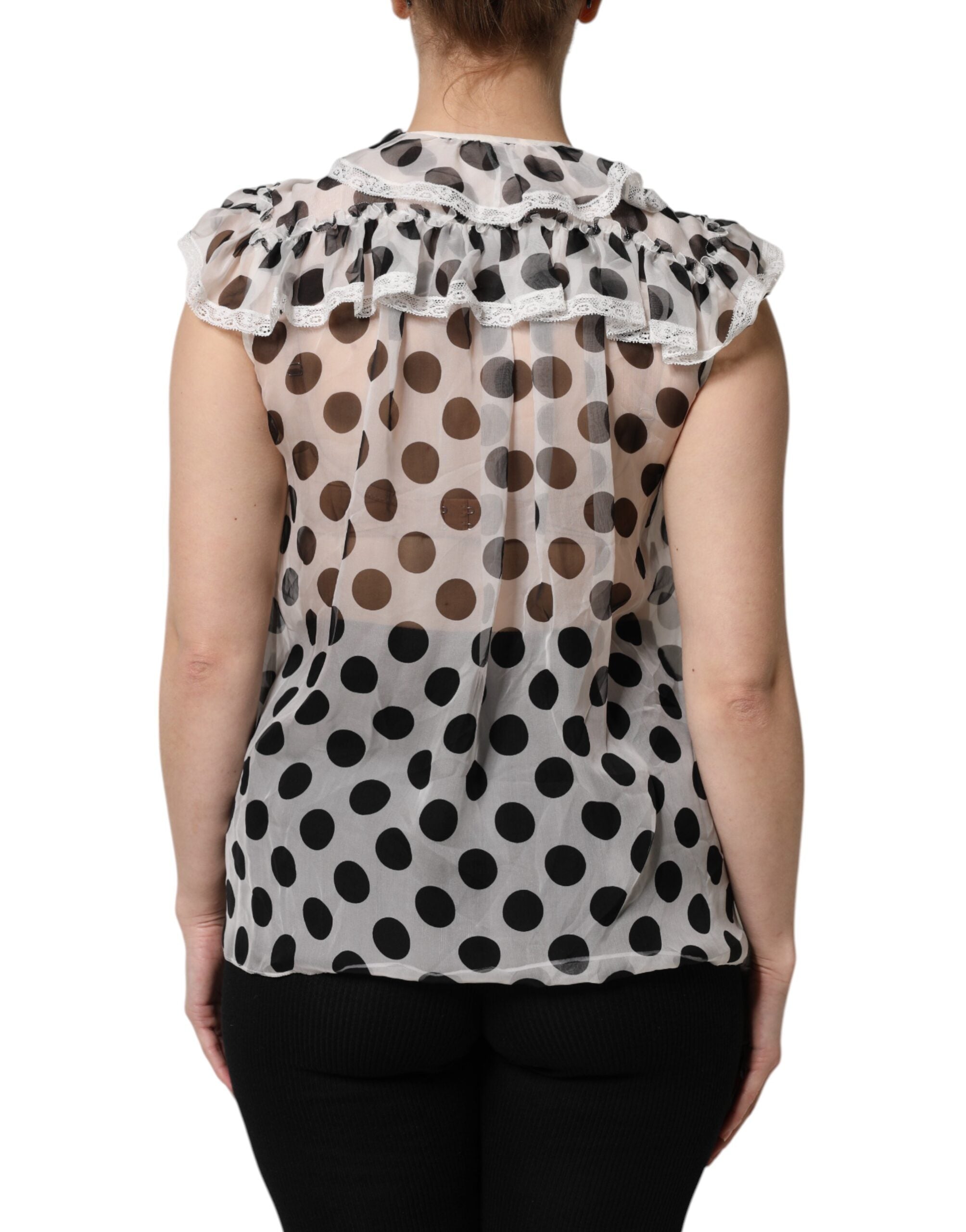 Haut sans manches en coton blanc et noir à pois de Dolce & Gabbana, style élégant et décontracté.