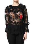 Blouse noire en coton avec dentelle florale pour femmes de Dolce & Gabbana, détails élégants et design sophistiqué.