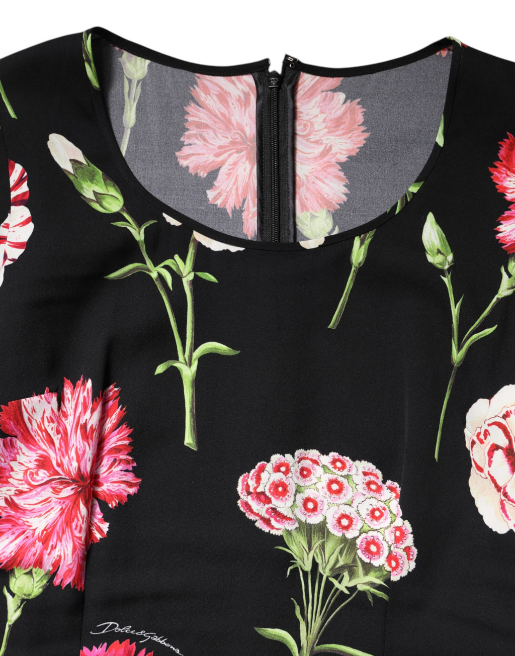 Blouse longue noire à fleurs pour femmes de Dolce & Gabbana, manches longues et design élégant visible sur l'image.