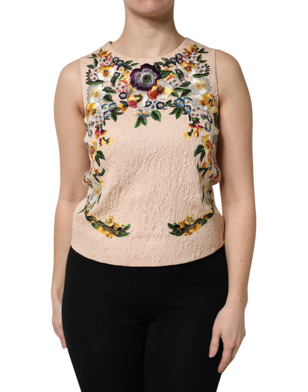 Débardeur sans manches beige Dolce & Gabbana avec broderie florale délicate et détails élégants.