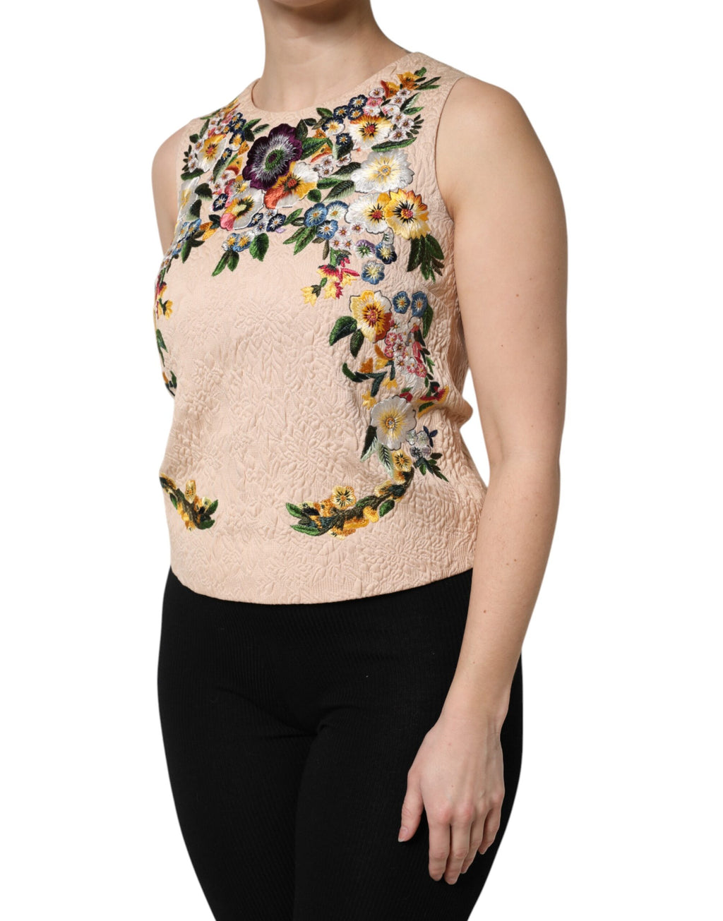 Débardeur sans manches beige Dolce & Gabbana avec broderie florale élégante et détails sophistiqués.
