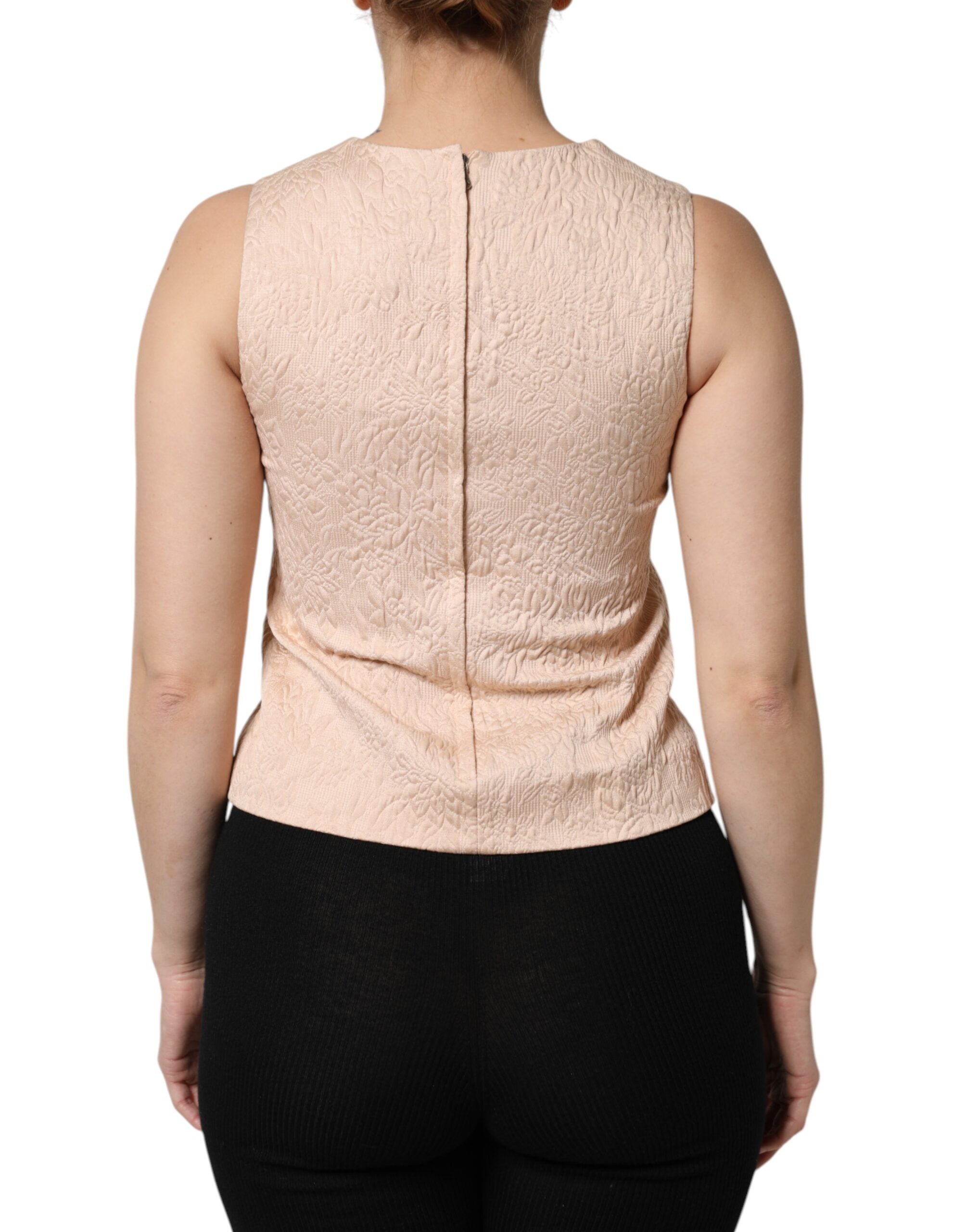 Débardeur sans manches beige Dolce & Gabbana avec broderie florale délicate, idéal pour un style élégant et féminin.