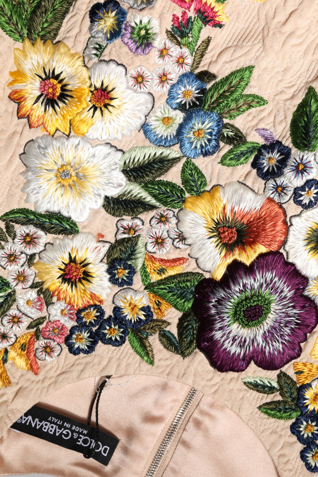 Débardeur sans manches beige Dolce & Gabbana avec broderie florale élégante et détails en embroidery.