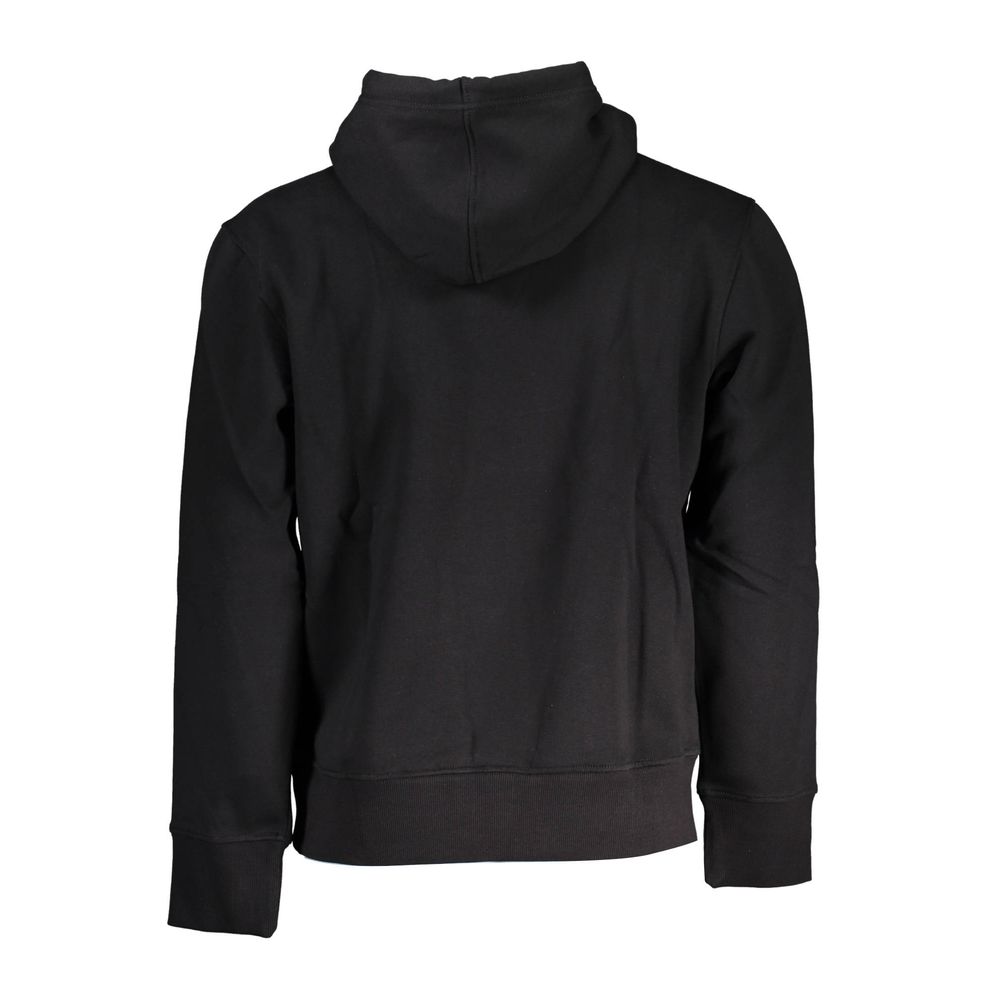 Sweatshirt homme en coton noir de la marque Calvin Klein, coupe classique avec logo discret sur la poitrine.