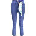 Jean skinny en coton bleu pour femmes de la marque Guess Jeans, coupe ajustée et style moderne visible sur l'image.