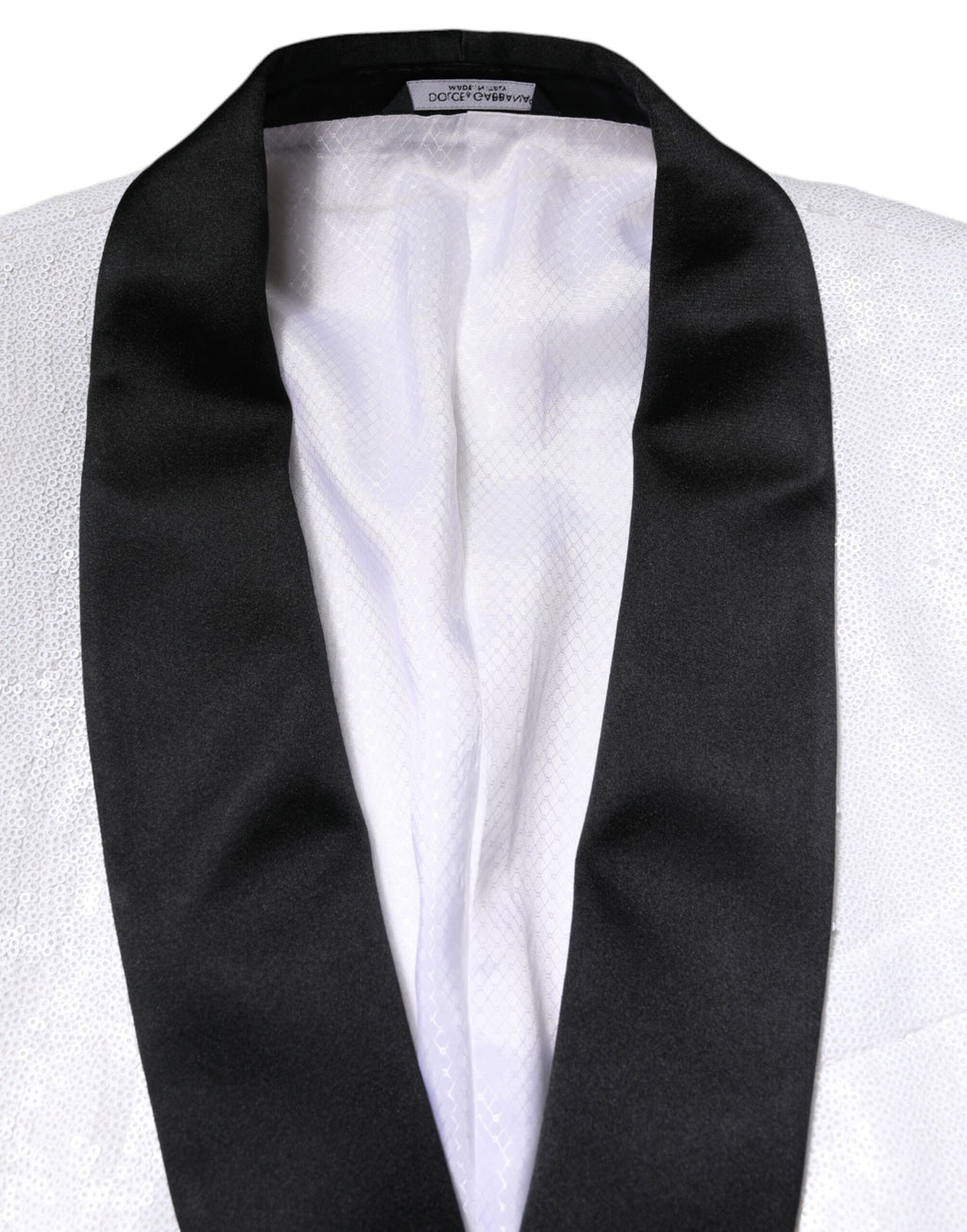 Manteau blazer en nylon blanc Dolce & Gabbana à boutonnière simple, coupe élégante et détails raffinés.