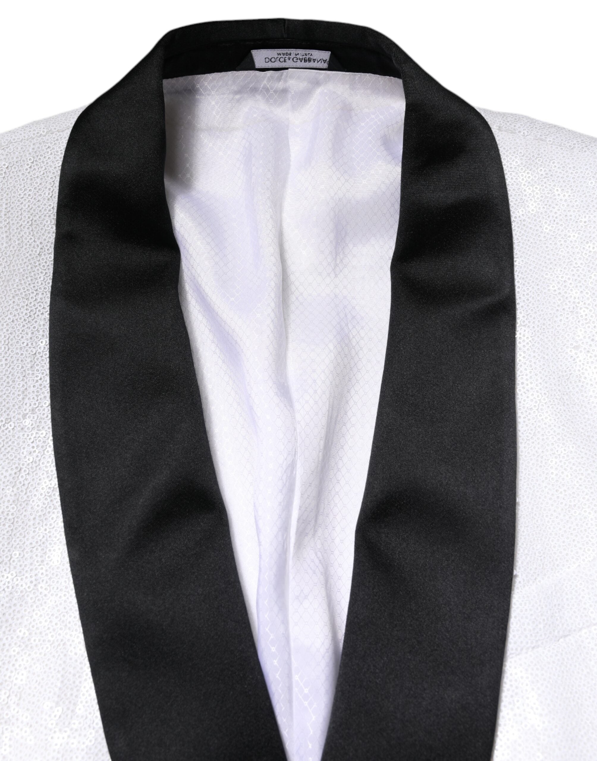 Manteau blazer en nylon blanc Dolce & Gabbana à boutonnière simple, coupe élégante et détails raffinés.