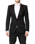 Blazer noir Dolce & Gabbana Sicilia orné de cristaux, veste élégante avec détails sophistiqués et finition raffinée.