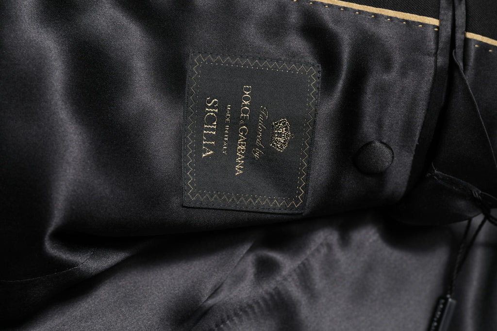 Blazer Dolce & Gabbana noir SICILIA orné de cristaux, veste élégante en tissu chic avec détails brillants visible sur l'image.