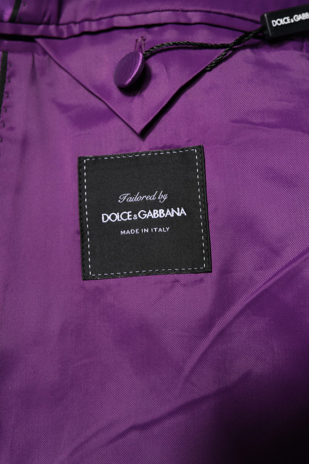 Costume pour homme Dolce & Gabbana violet à double boutonnage, blazer élégant avec poches et revers.