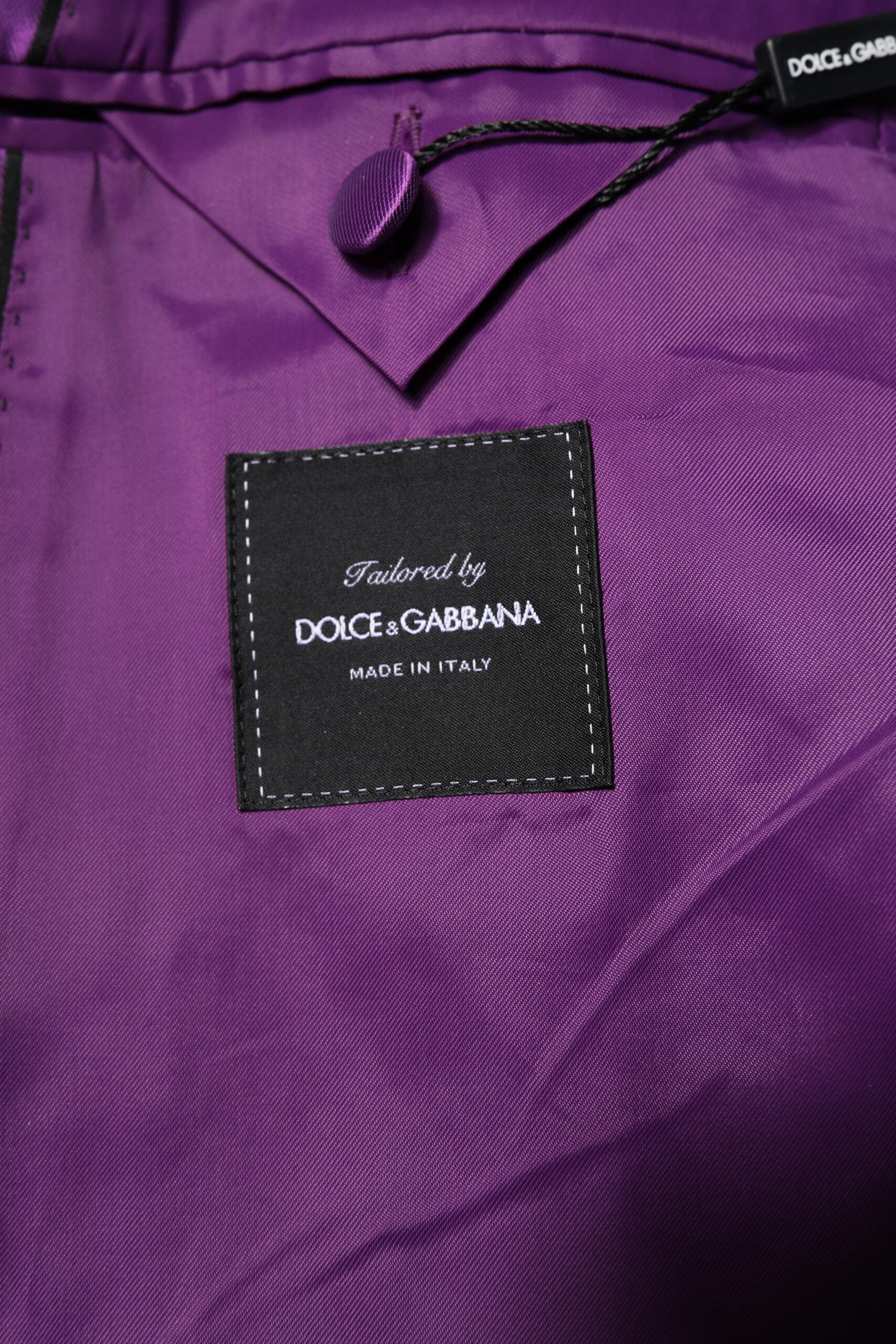 Costume pour homme Dolce & Gabbana violet à double boutonnage, blazer élégant avec poches et revers.