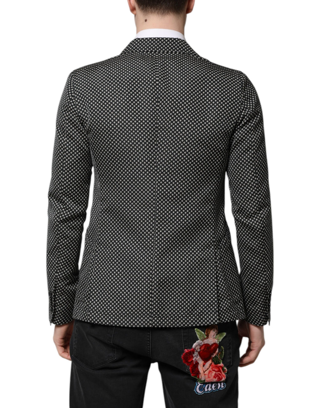 Costume homme Dolce & Gabbana avec manteau blazer noir et blanc à motif élégant, en tissu élégant et coupe classique.